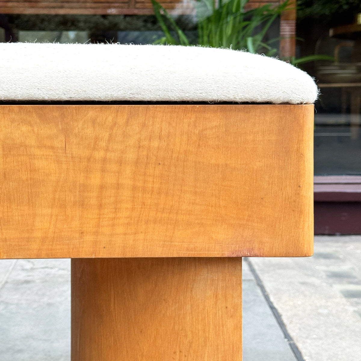 An upholstered plywood bench designed by British Modernist, Gerald Summers and manufactured by his company, Makers of Simple Furniture (1931-1940).