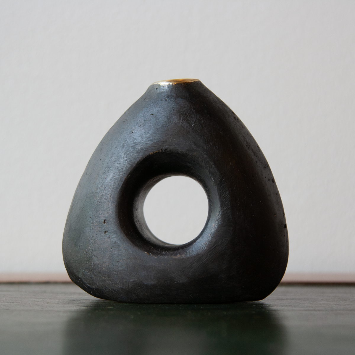 See-Through Vase #3787 by Werkstätte Carl Auböck, a sculptural solid brass object showcasing the workshop’s signature modernist design. This elegantly crafted piece blends functionality with artistic form, embodying Auböck’s timeless aesthetic.