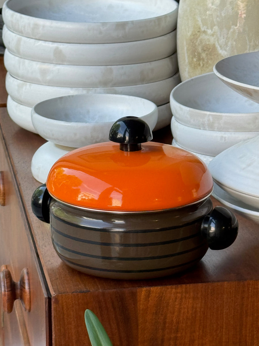 An enamelled metal pot, designed during the 1970s by Carl Auböck III during the 1970s.