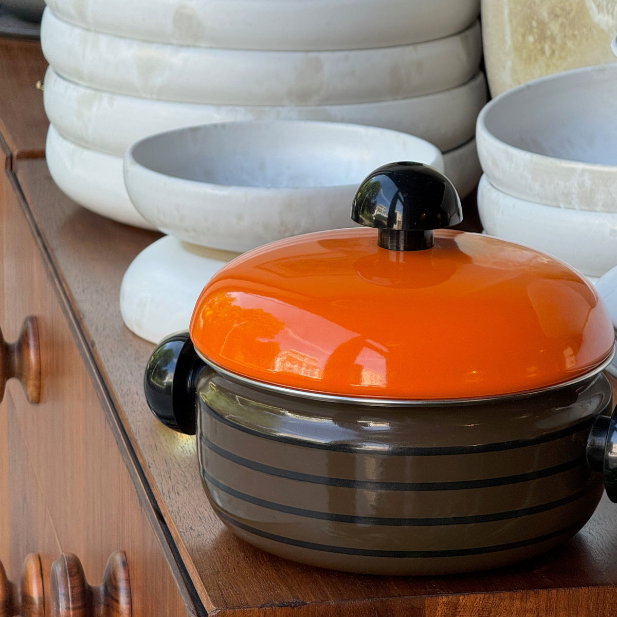 An enamelled metal pot, designed during the 1970s by Carl Auböck III during the 1970s.