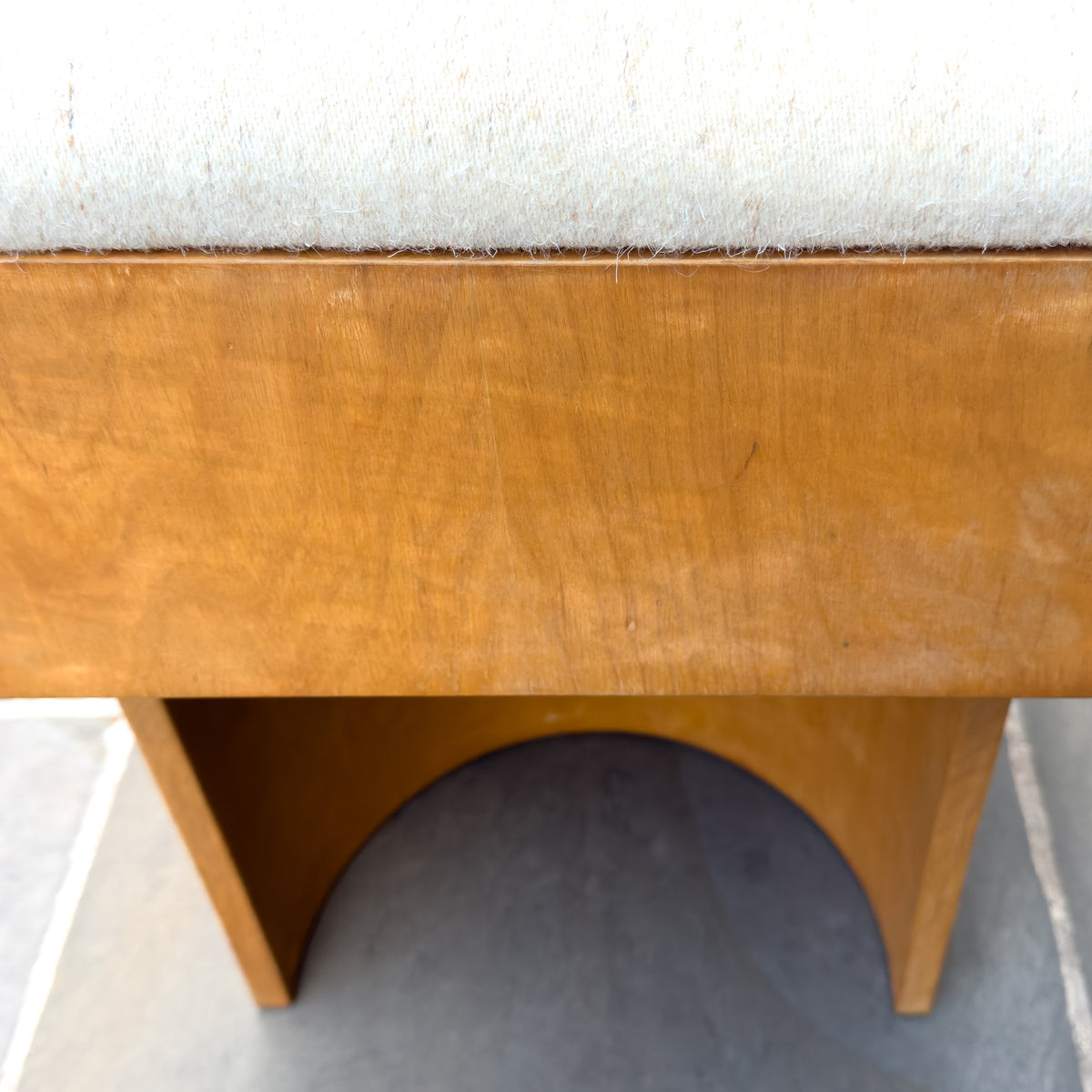An upholstered plywood bench designed by British Modernist, Gerald Summers and manufactured by his company, Makers of Simple Furniture (1931-1940).