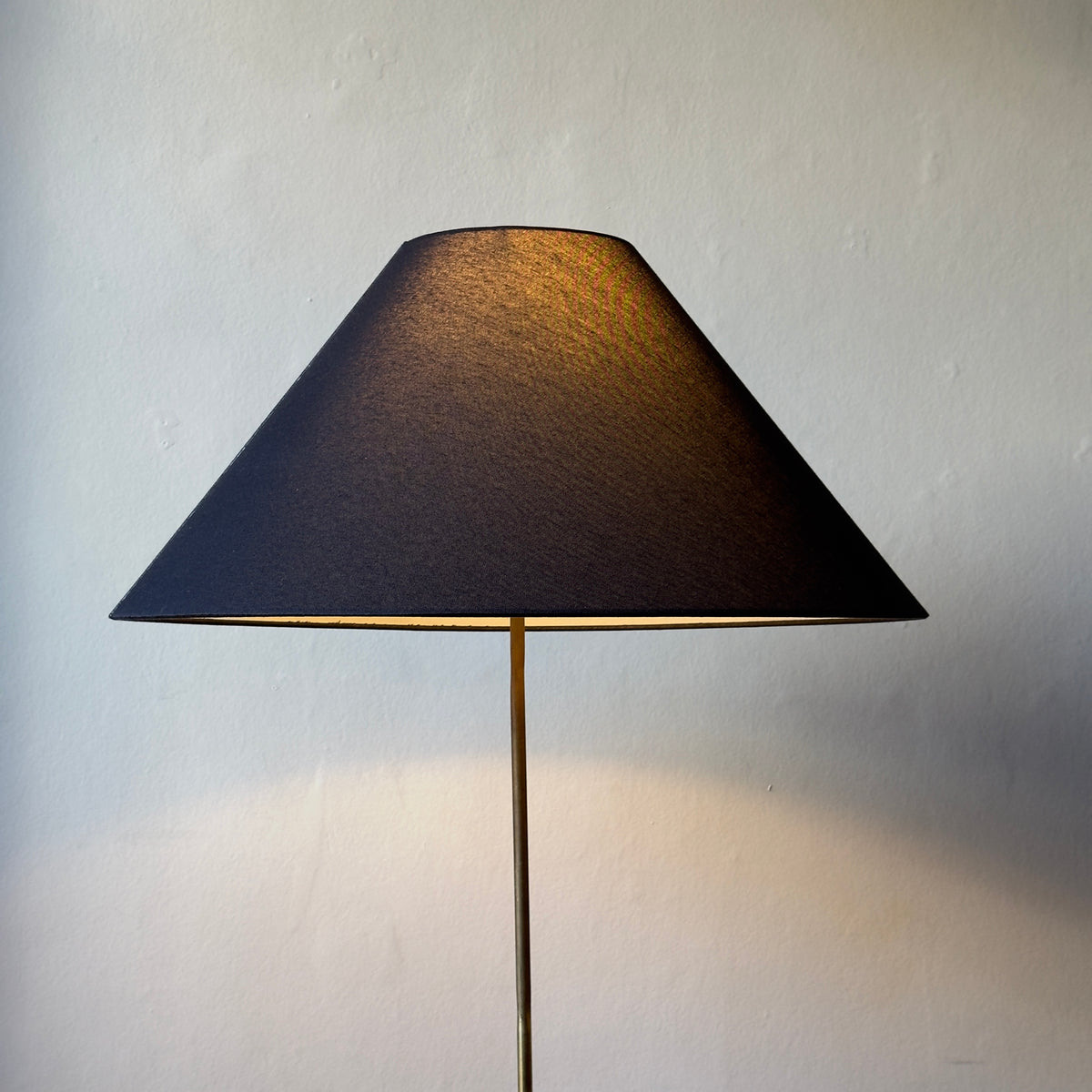 An original vintage leather-bound brass telescopic floor lamp from Denmark. This mid-century piece features an adjustable design with a rich patina, available from Sigmar London.