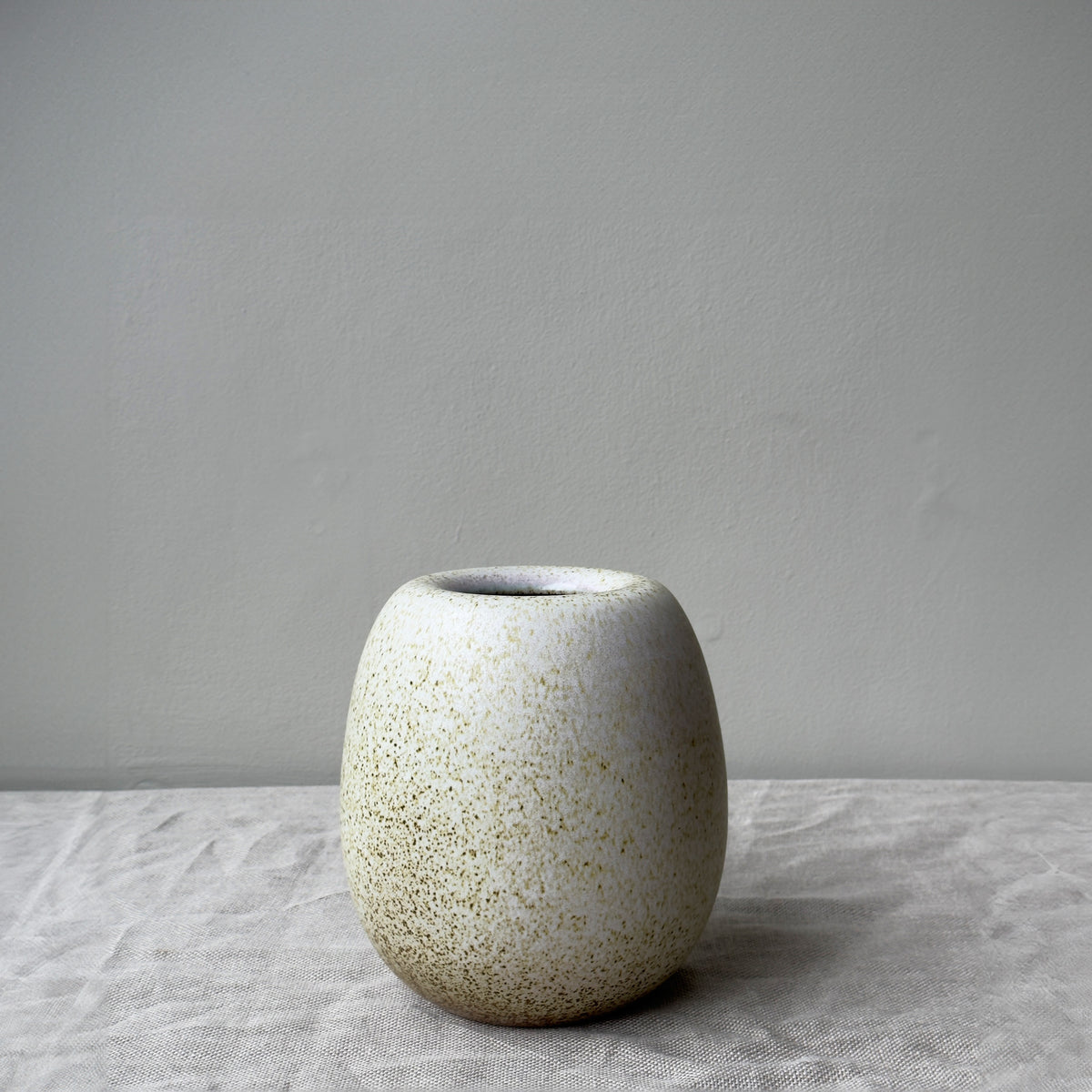 Handmade speckled stoneware vase in pale yellow by K.H. Würtz, crafted in Denmark. 