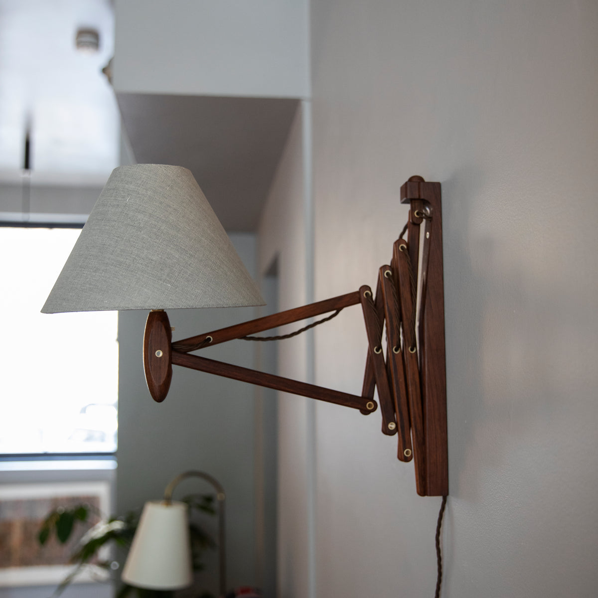 Small Rosewood 'Sax' Wall Lamp / Erik Hansen for Le Klint, 1952