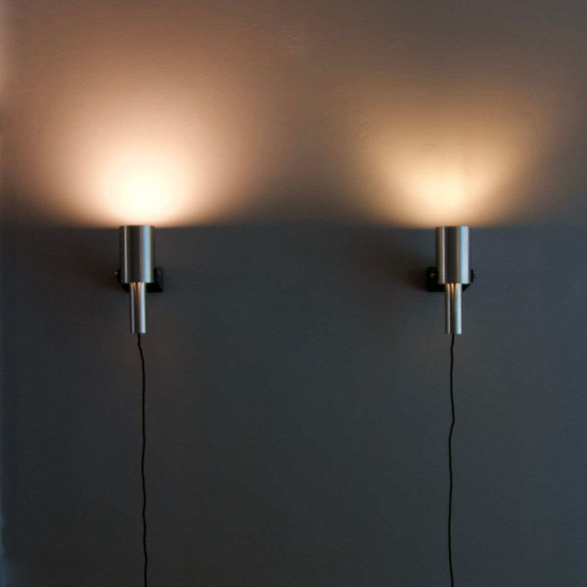 A pair of "Sonet" wall lamps/ Hans Per Jeppesen, For Fog & Mørup, Denmark, circa 1965.