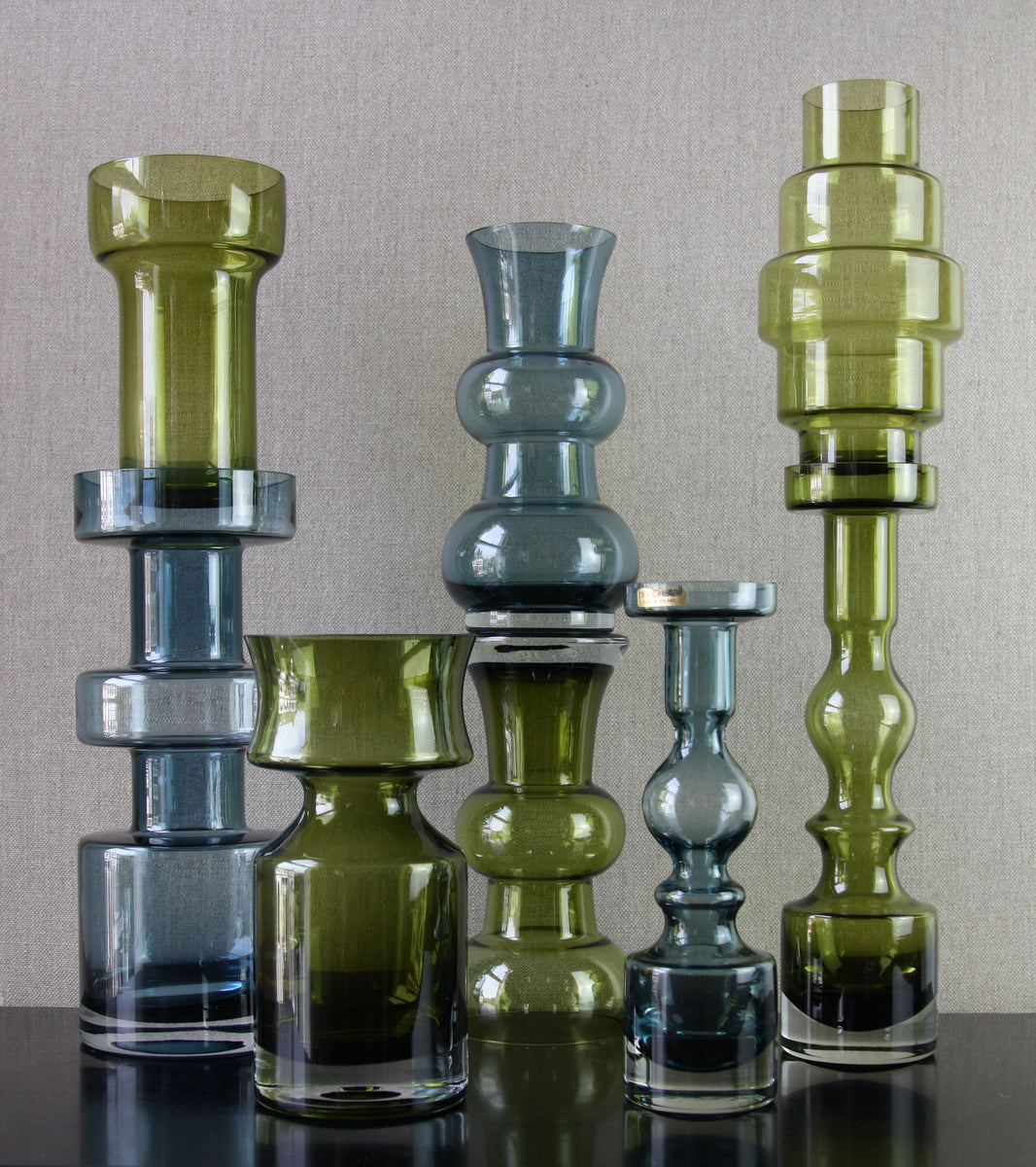 Large collection of olive green and steel blue riihimaki glass vases