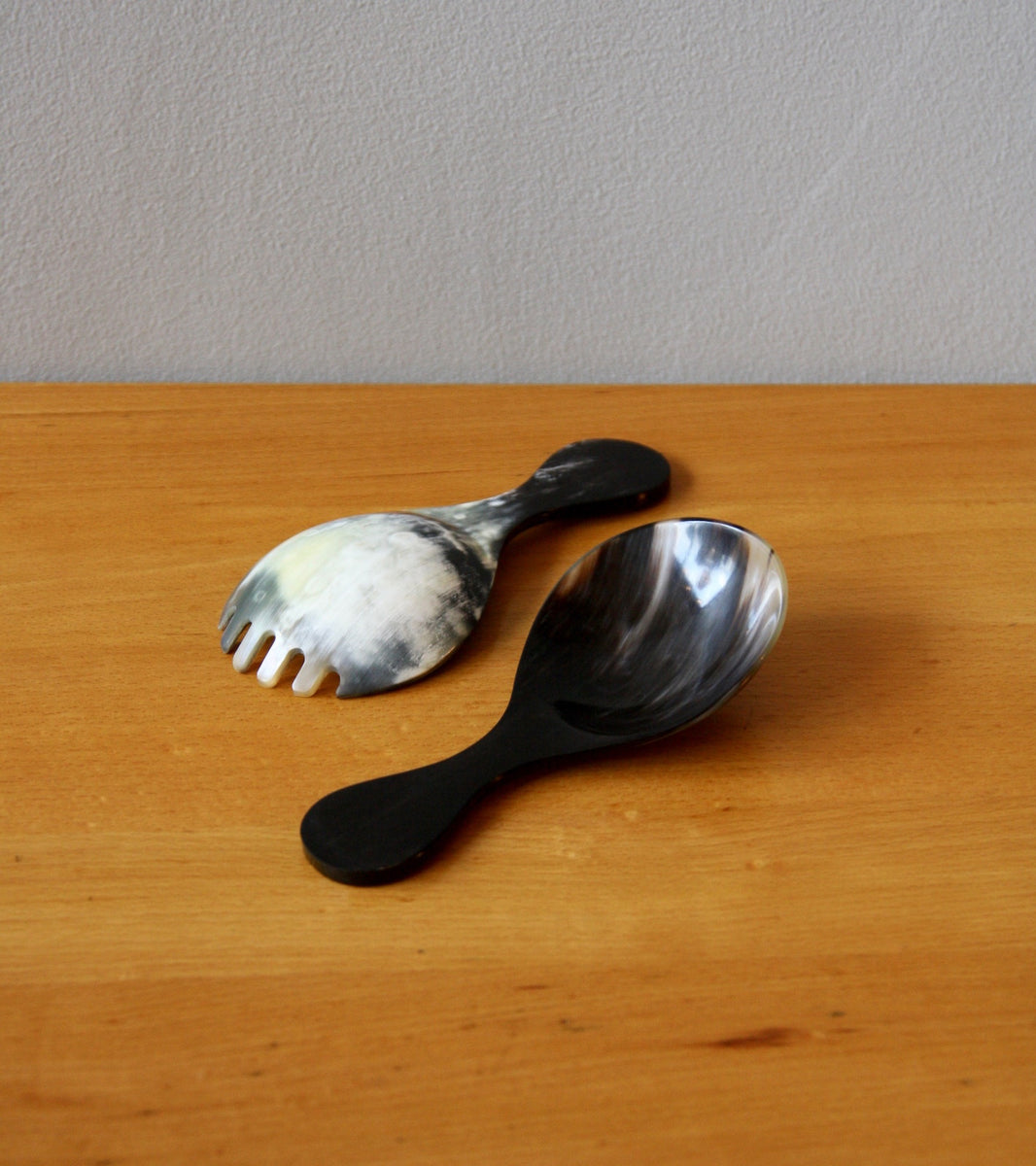 Predominantly Black with Dispersed Colouring at the Front Horn Salad Servers, Carl Auböck III