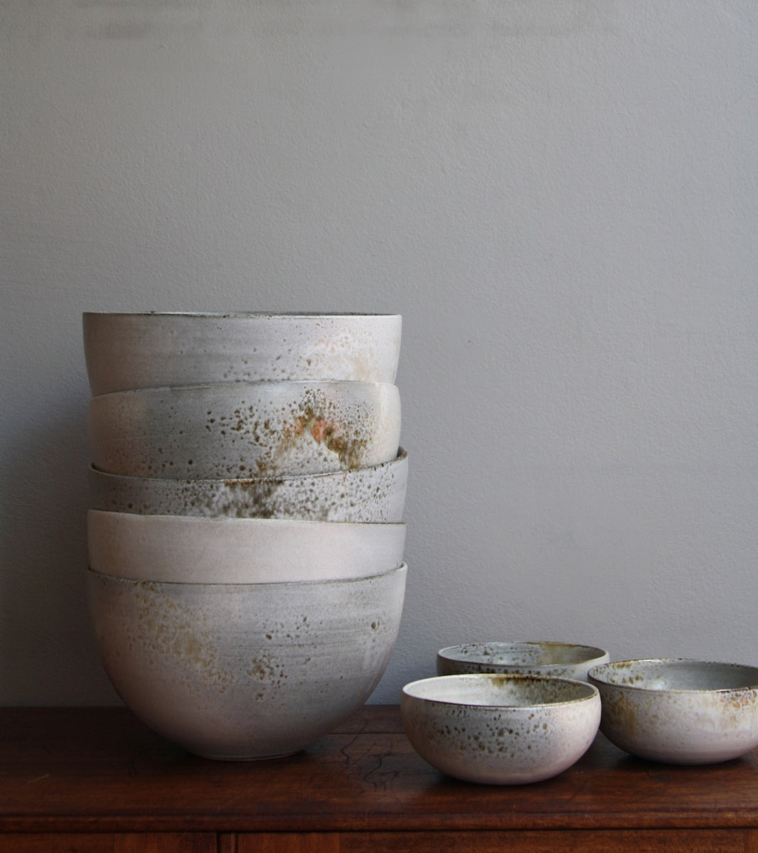 arge deep bowl by Kasper Würtz, featuring a white and brown ‘Shape 12’ glaze. This handcrafted Danish ceramic piece showcases Würtz’s signature balance of form, texture, and Nordic craftsmanship. Available at Sigmar London.